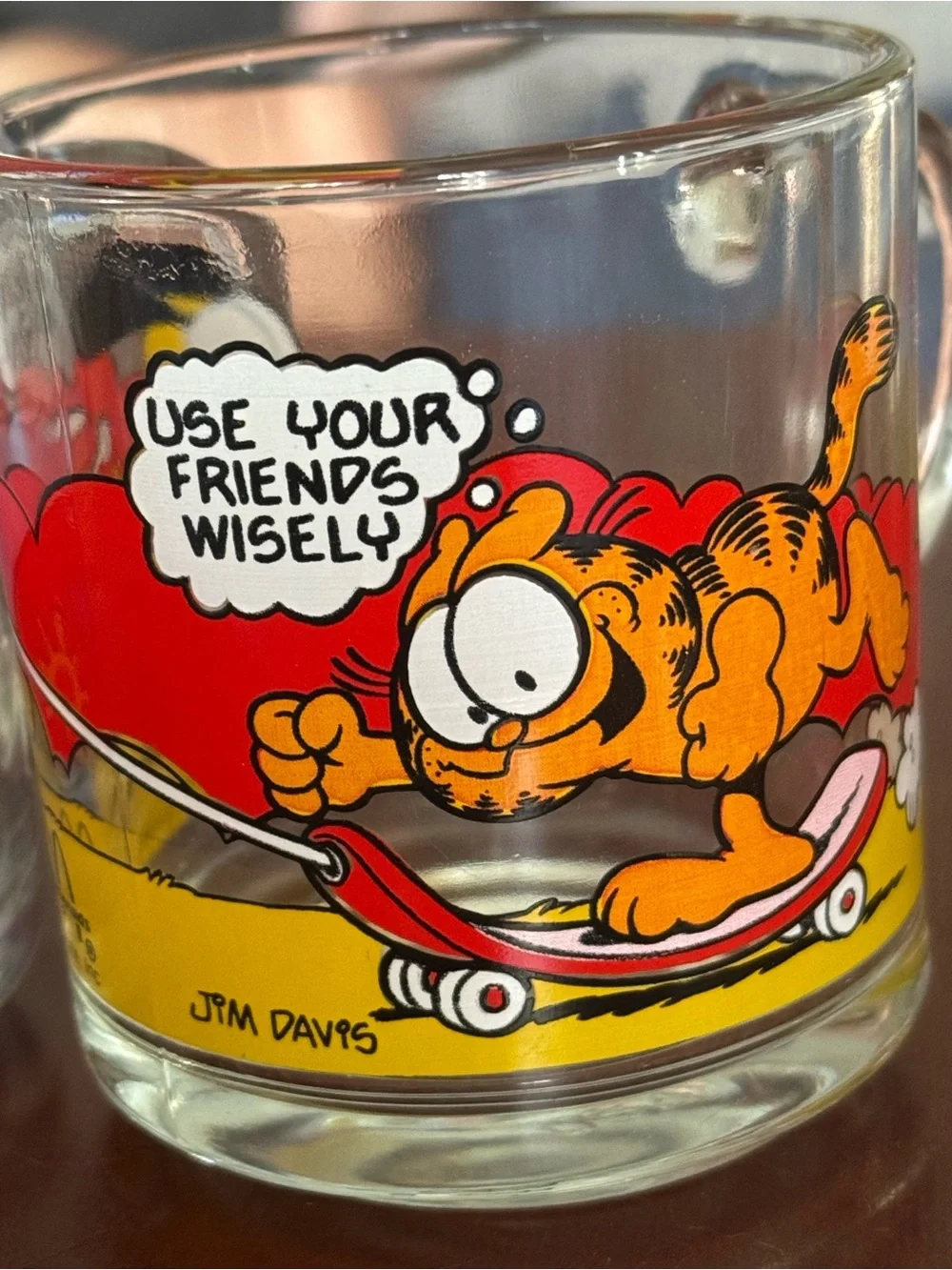 McDonald's Clear Glass Tumblers with Orange Cartoon Character Artwork (Set of 2)
